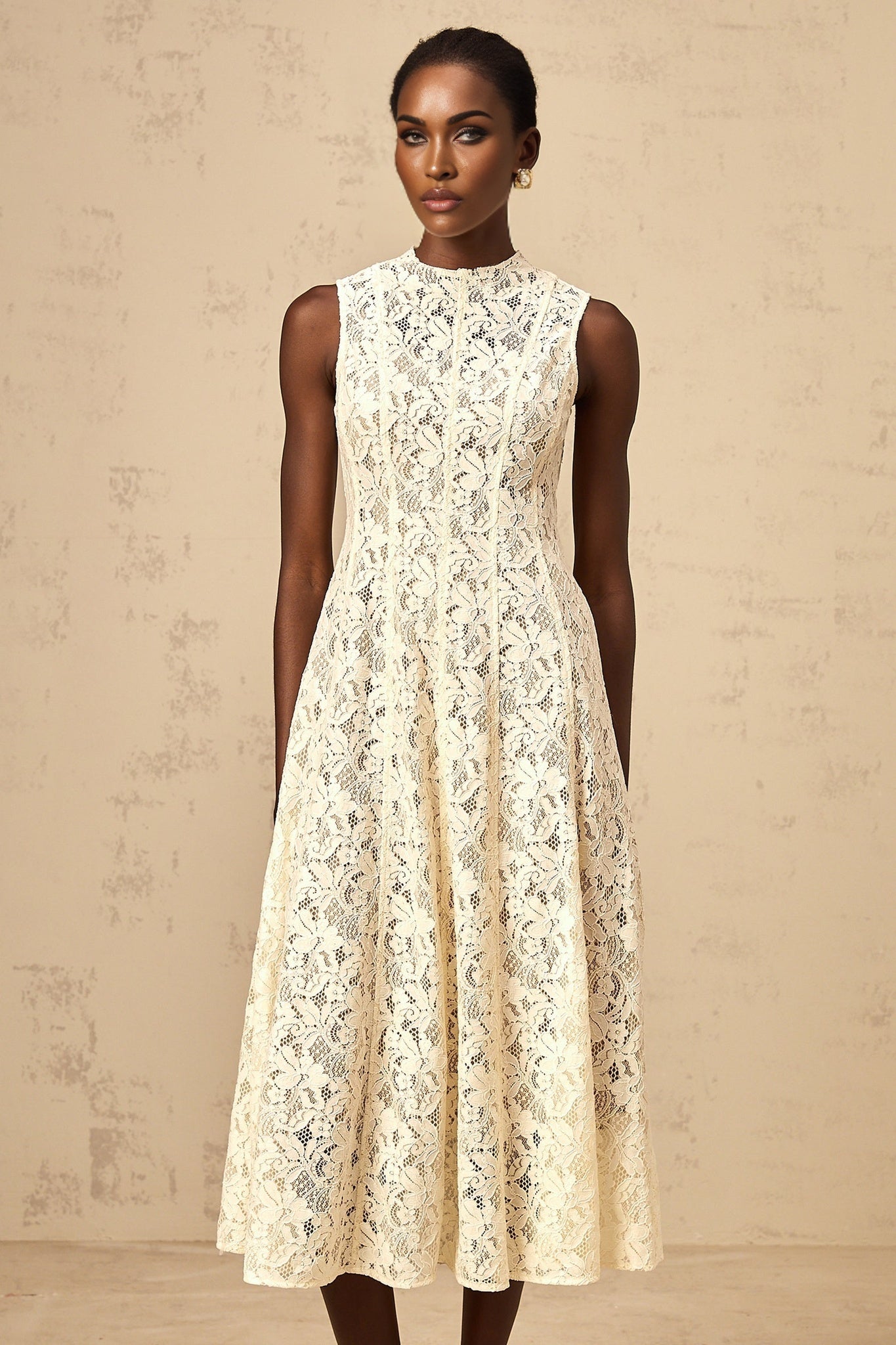 Beige midi dress with floral lace pattern and flared skirt design