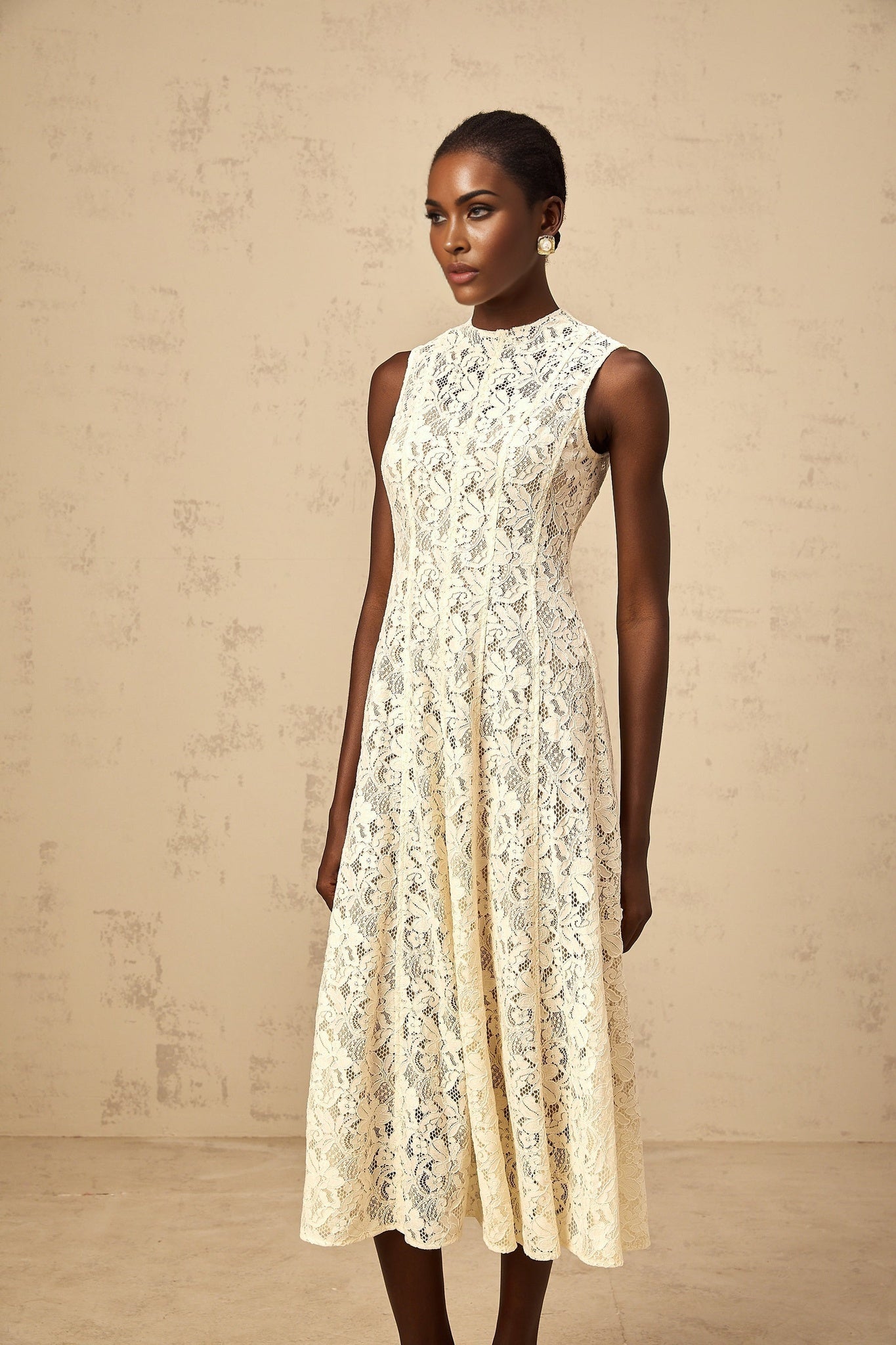Beige midi dress with floral lace pattern and flared skirt