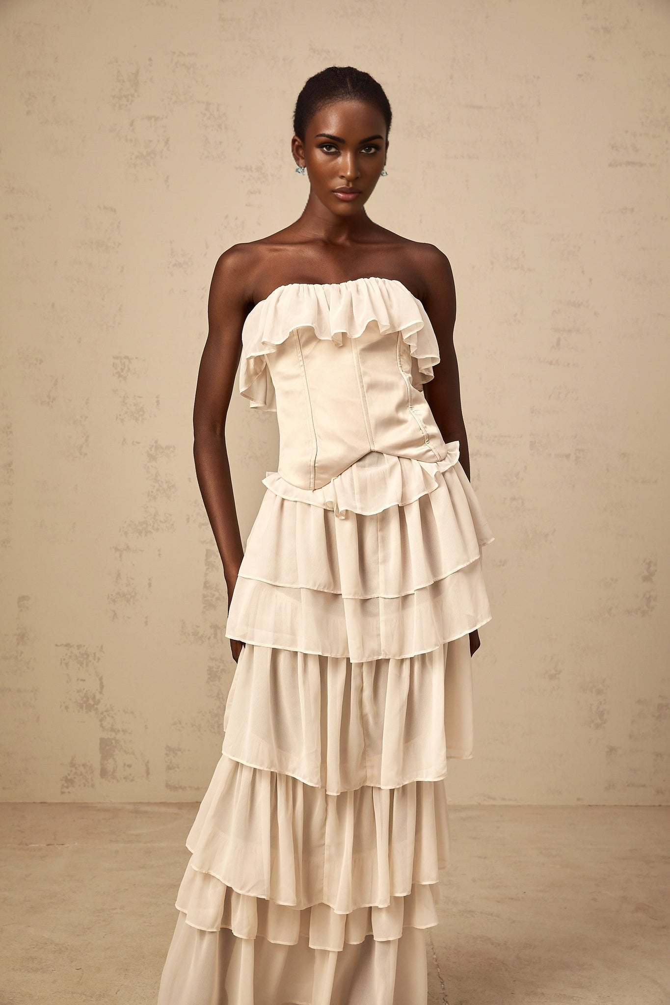 Beige off shoulder dress and corset set with tiered skirt and matching top