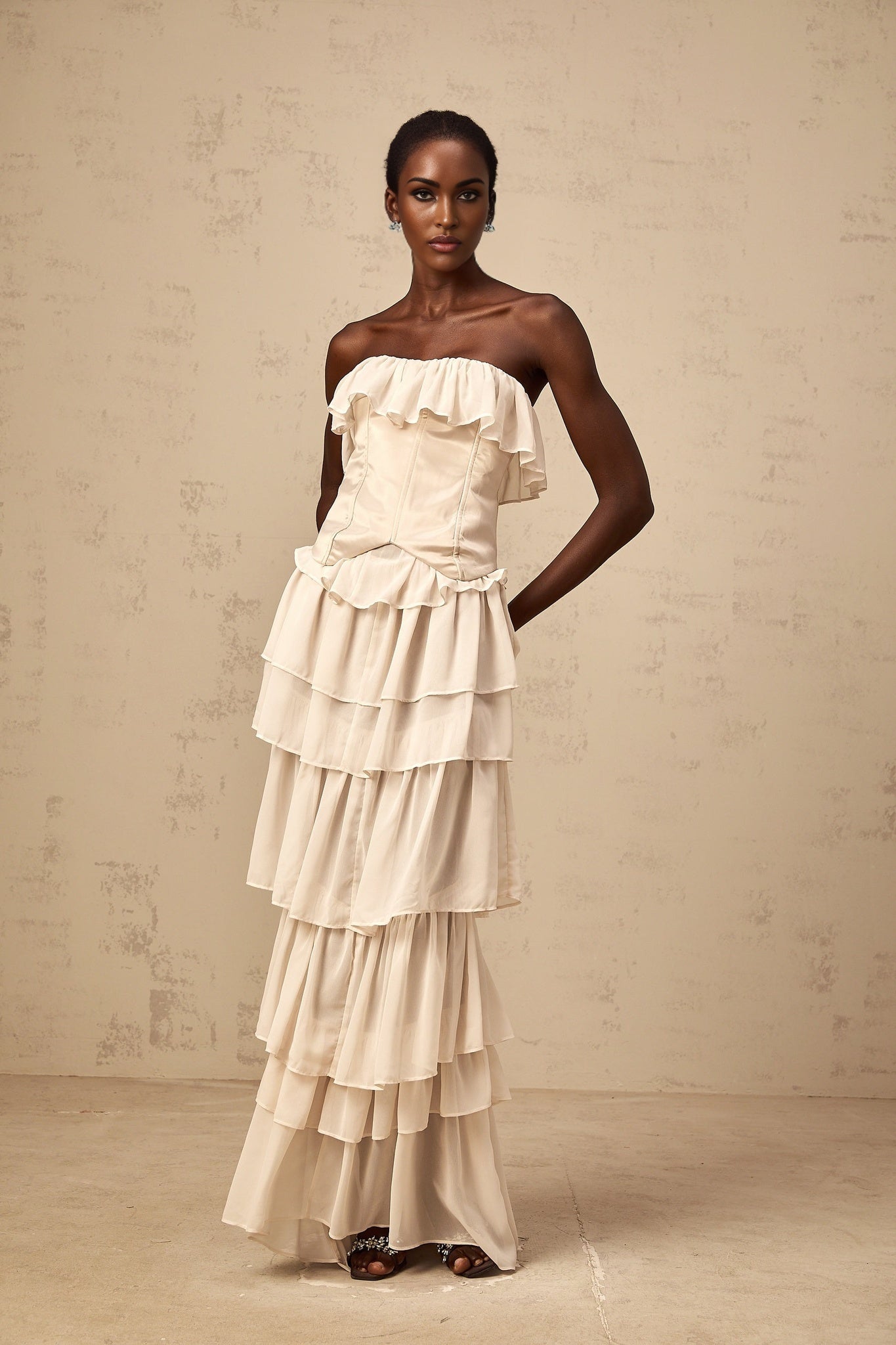 Beige off shoulder dress and corset set with tiered skirt and matching top