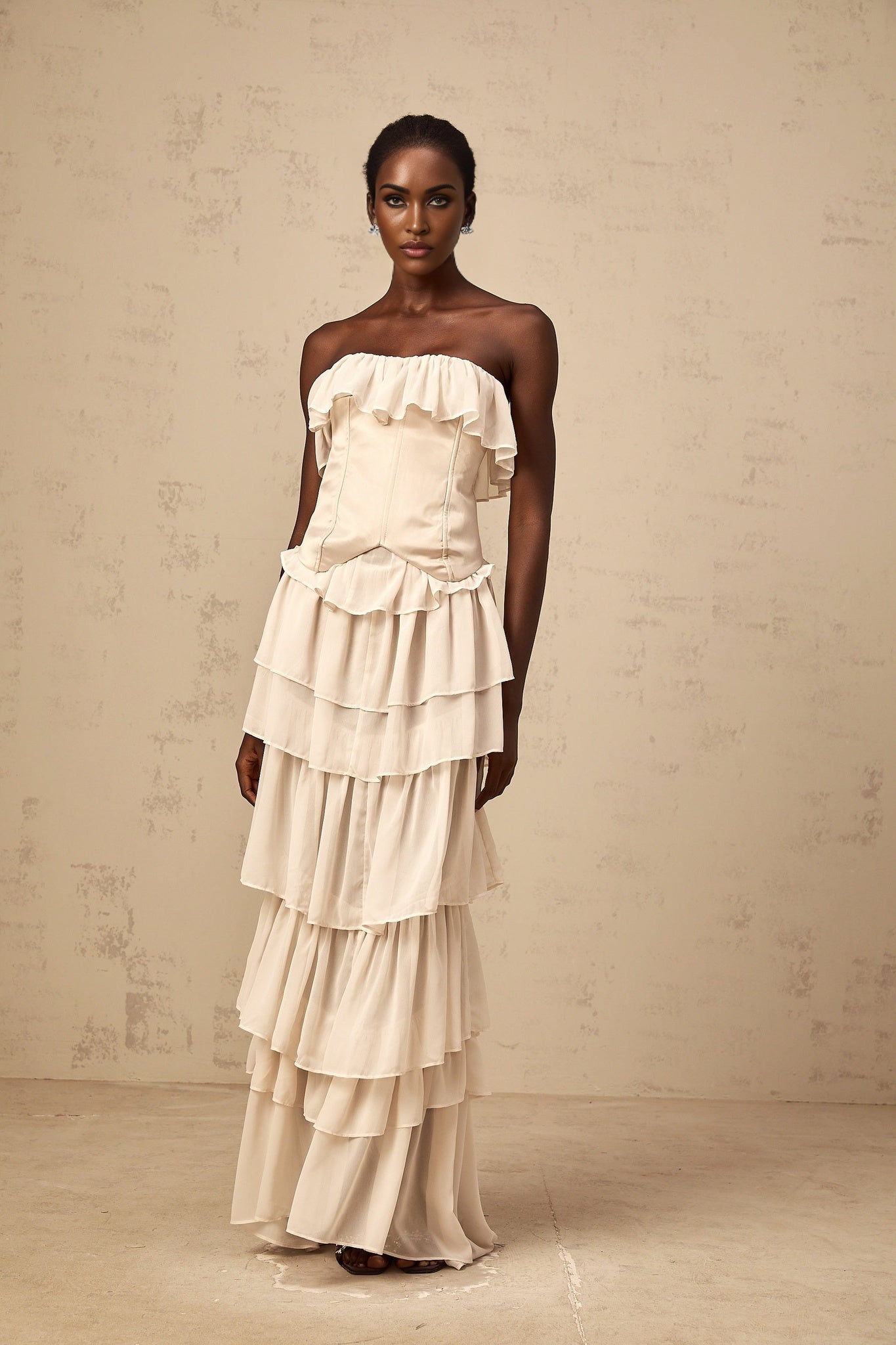 Beige off shoulder tiered dress and corset set with matching design