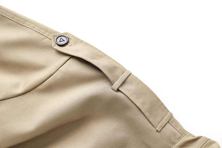 Beige oversized belted jacket with military-inspired design