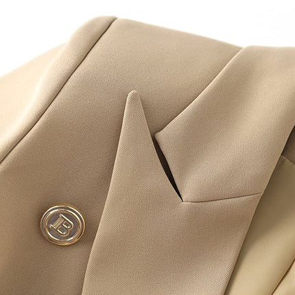 Beige tailored double-breasted jacket with gold button accents and belted waist