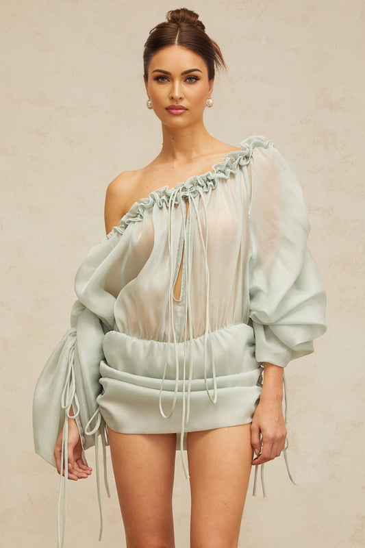 Beryl light green mini dress with ruched fabric and ruffled trim