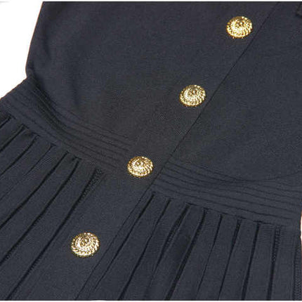 Black A-line dress with gold accents