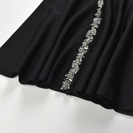 Black A-line halter neckline dress with floral embellishment