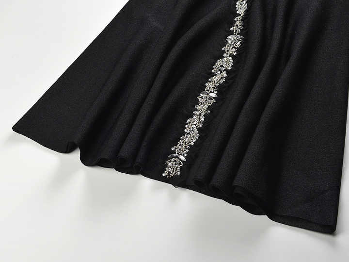 Black A-line halter neckline dress with floral embellishment