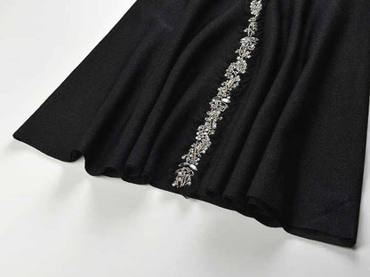 Black A-line halter neckline dress with floral embellishment