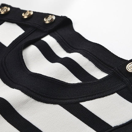 Black and white contrast striped sleeveless body-con dress with gold button accents on shoulders