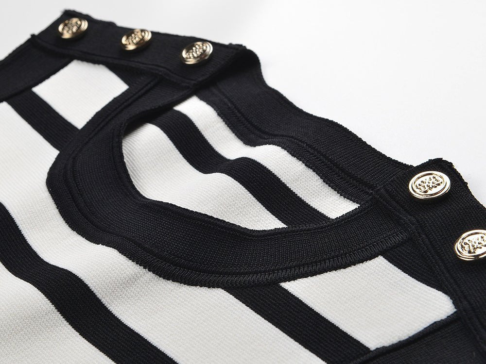 Black and white contrast striped sleeveless body-con dress with gold button accents on shoulders