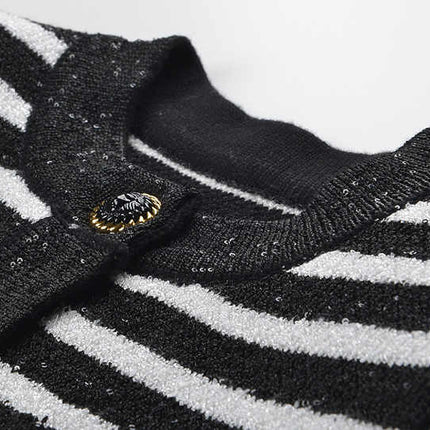 Black and white striped fitted knit cardigan with gold-tone buttons