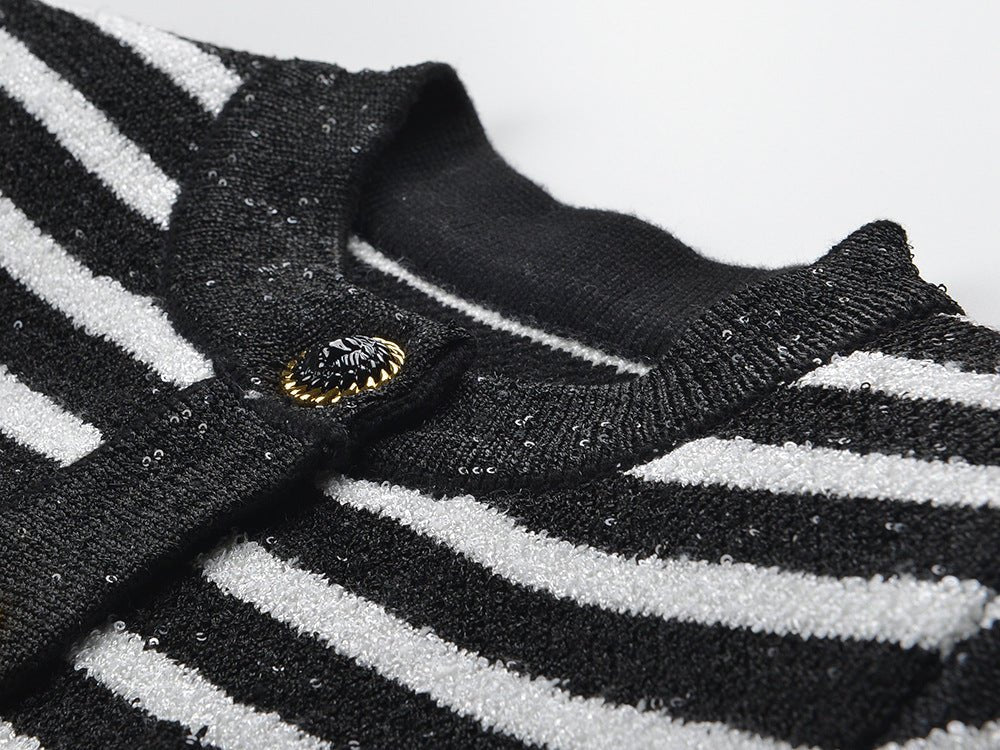 Black and white striped fitted knit cardigan with gold-tone buttons and front pockets