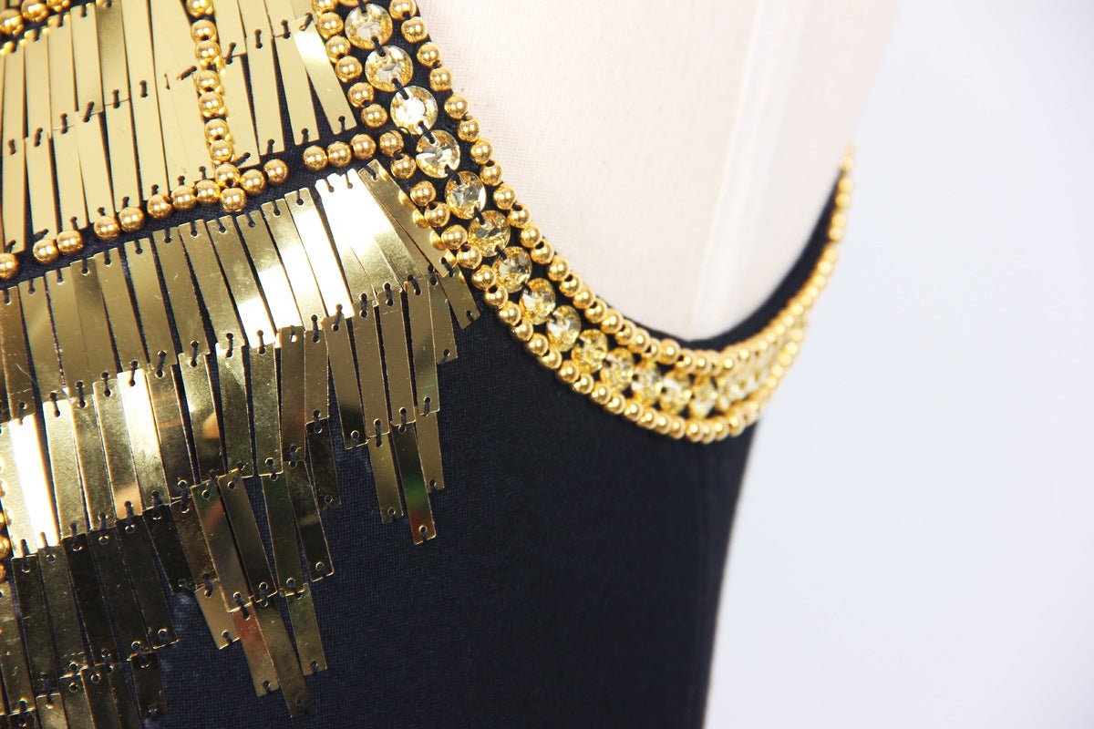 Black bodycon dress with gold sequin fringe