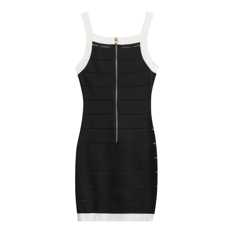 Black bodycon dress with white panel detailing and gold button embellishments
