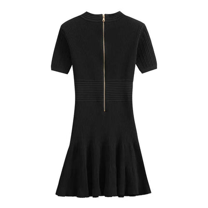 Black bodycon knit dress with ribbed texture and gold button details