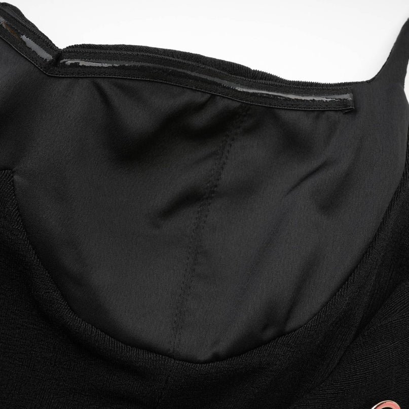 Black bustier style midi dress named Ailbhe on model against plain background