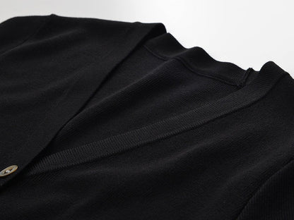 Black feather detailed knit cardigan for fall and winter fashion