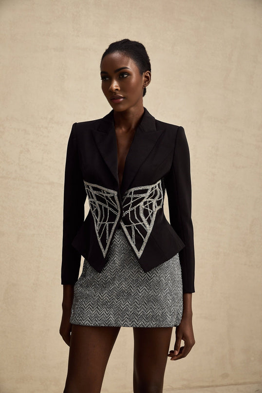 Black fitted jacket with embellished details and cinched waist named Genevieve