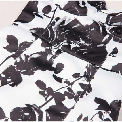 Black floral bodycon dress with halter neck on white background