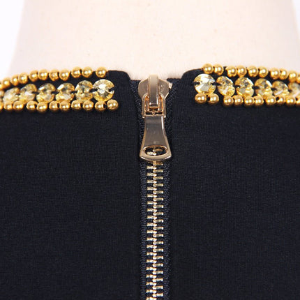 Black bodycon dress with gold sequin fringe