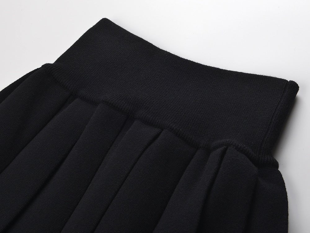 Black High-Waisted Flared Pleated Skirt with Gold Button Accents