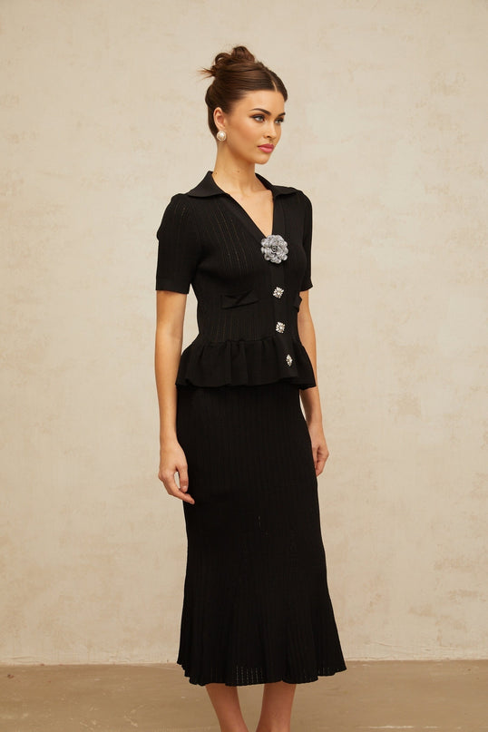 Black knit midi dress with embellishments and pointelle detailing