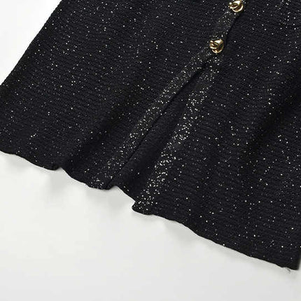 Black knit shirt jacket with gold button embellishments