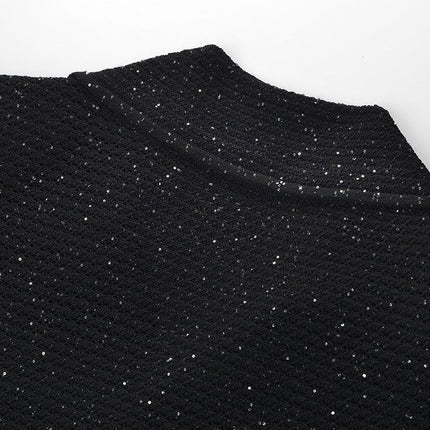 Black knit shirt jacket with gold button embellishments