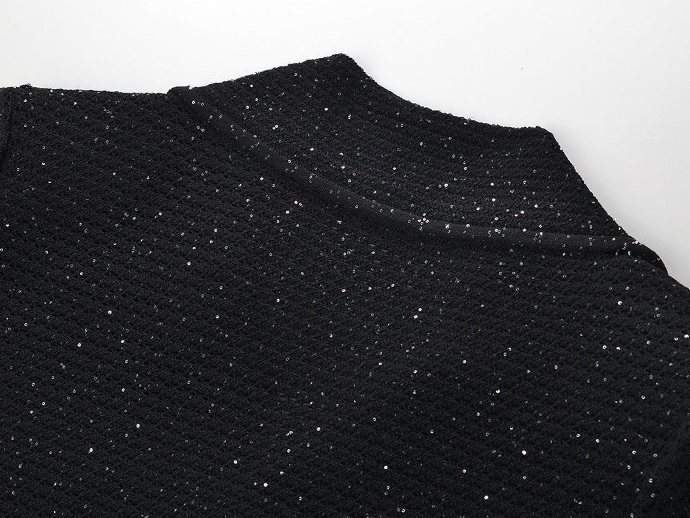 Black knit shirt jacket with gold button embellishments