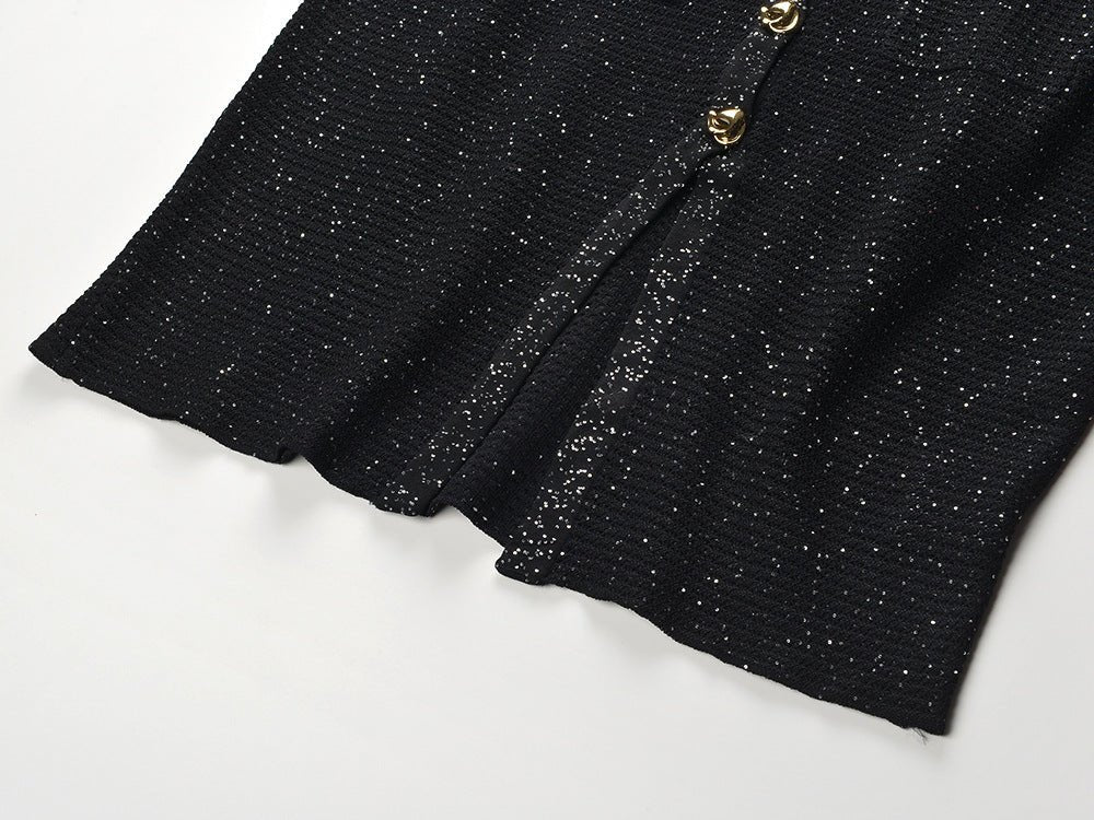 Black knit shirt jacket with gold button embellishments