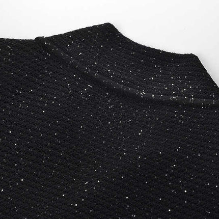 Black knit shirt jacket with gold button embellishments
