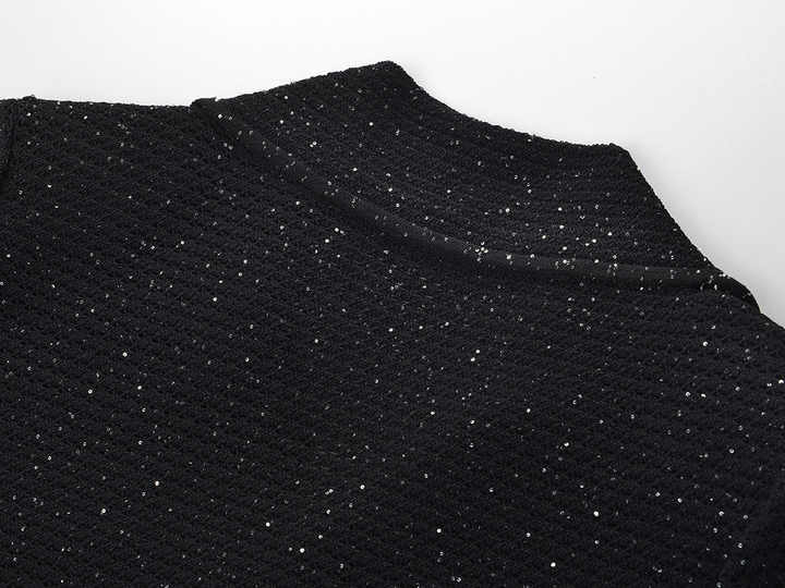 Black knit shirt jacket with gold button embellishments