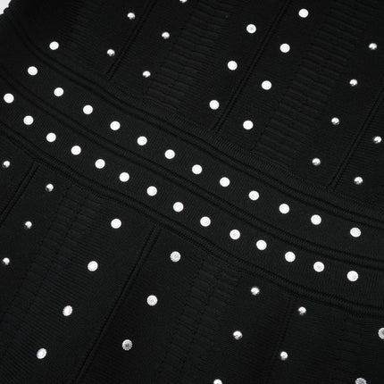 Black knitted mini dress with ruffle details and embellishments named Fabienne