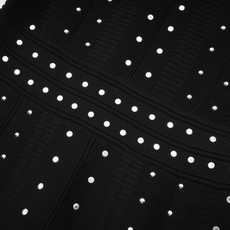 Black knitted mini dress with ruffle details and embellishments named Fabienne