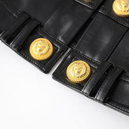 Black leather cropped jacket with gold button embellishments