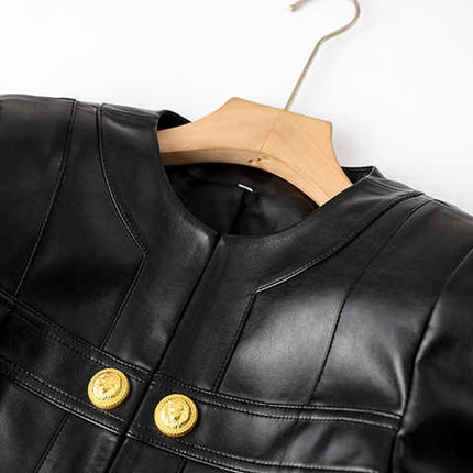 Black leather cropped jacket with gold button embellishments