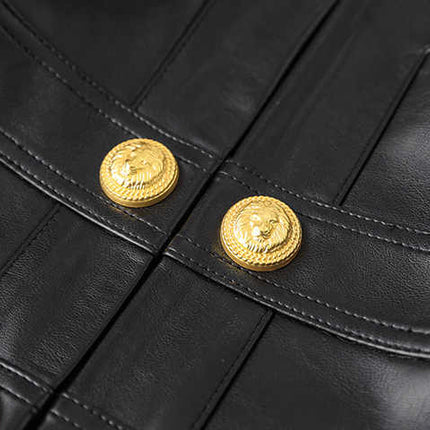 Black leather cropped jacket with gold button embellishments