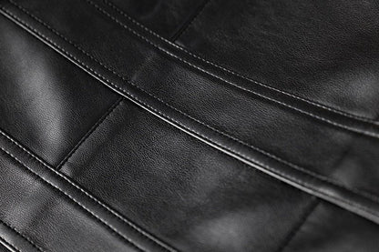 Black leather cropped jacket with gold button embellishments