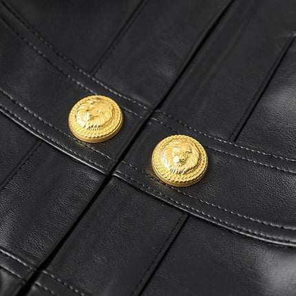 Black leather cropped jacket with gold button embellishments