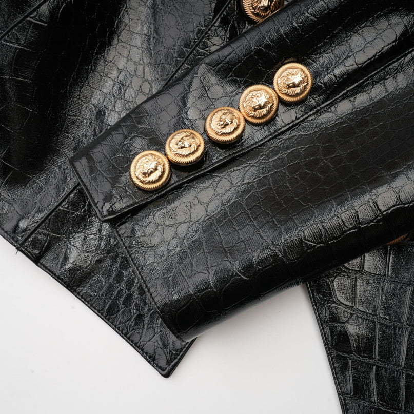 Black leather jacket with cinched waist design and Elodie branding
