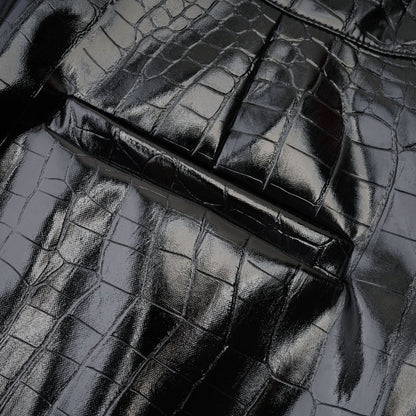 Genuine leatherlike jet black dress with professional pleats and a sleek buckle adornment