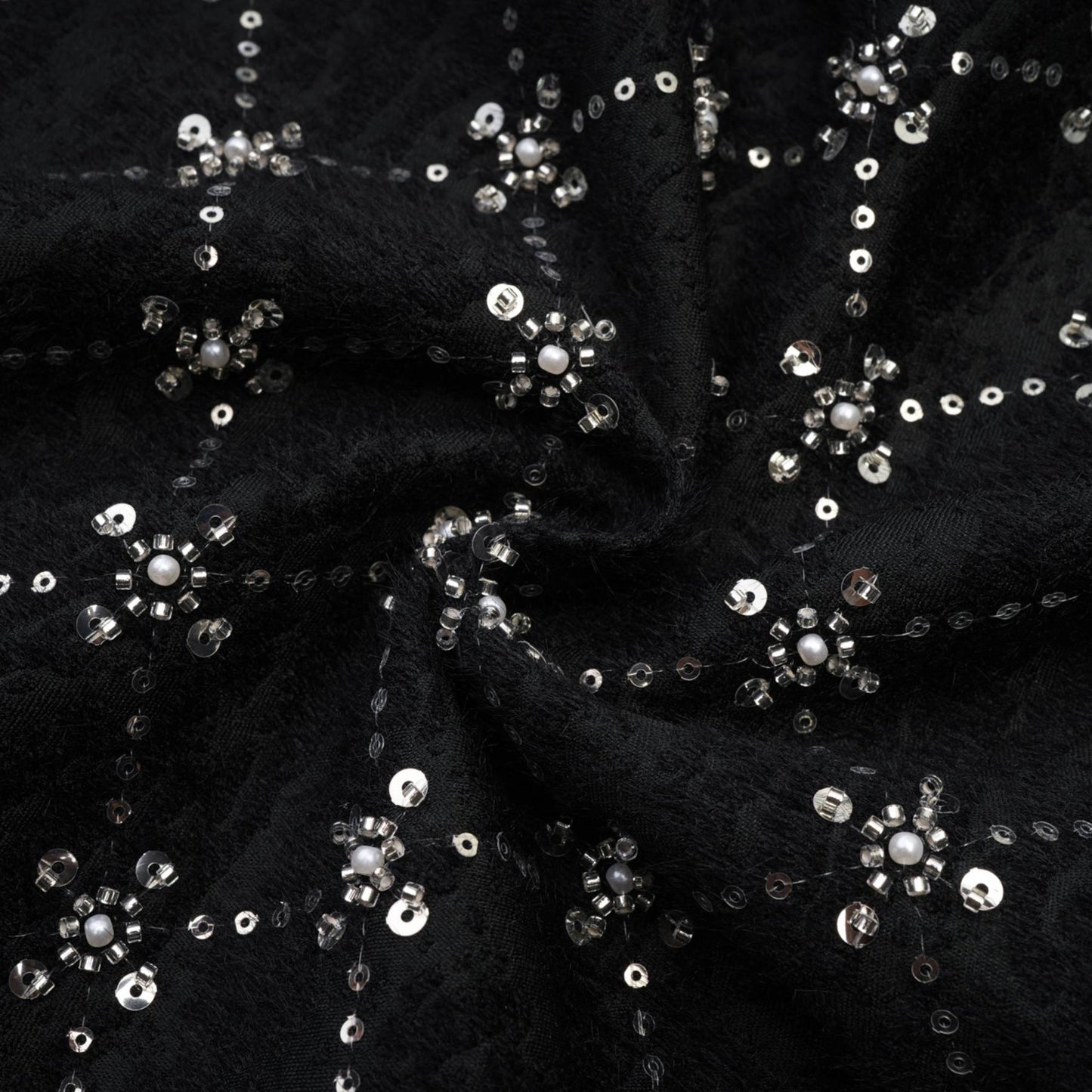 Black sleeveless dress with round neckline rear zipper % shiny crystal embellishments and made of 100% highquality polyester