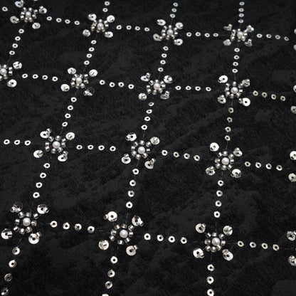 Black sleeveless dress with rear zipper and shiny crystal embellishments % polyester composition