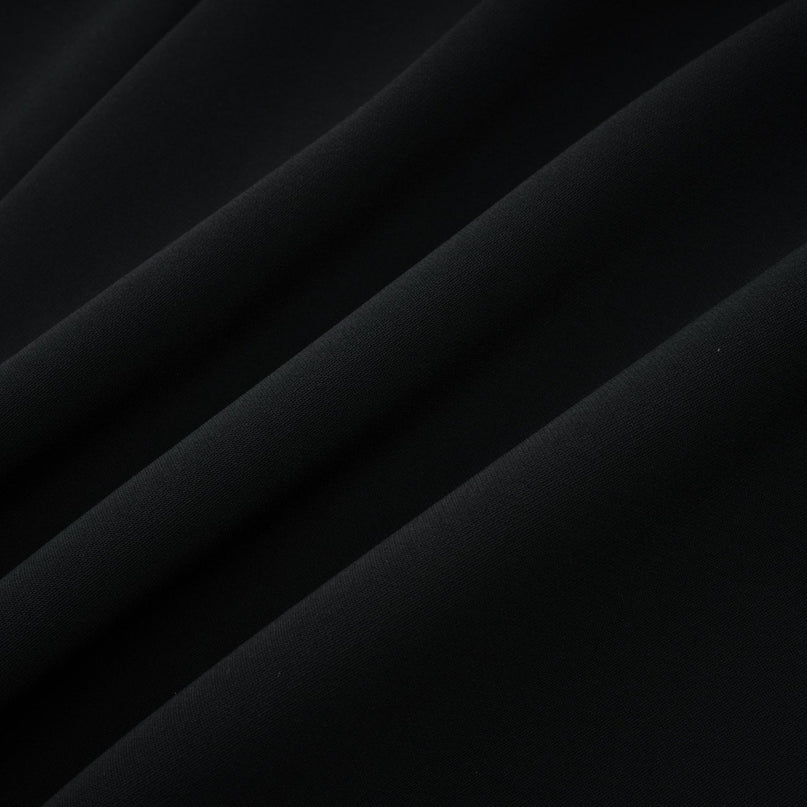 Black mini dress with faux pearl embellishments called Danae