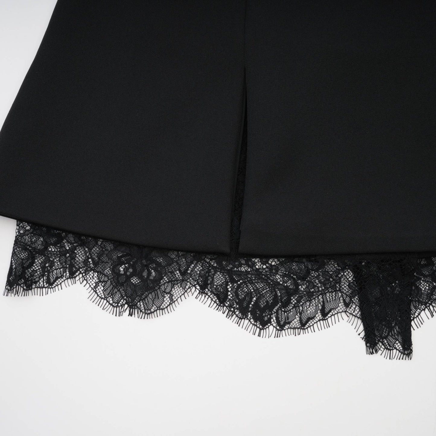 Black mini dress with lace details from Zephyra