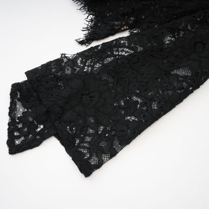 Black mini dress with lace trim featuring Kylitha design