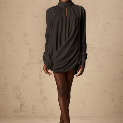 Black mini dress with ruched detailing and faux flower embellishments