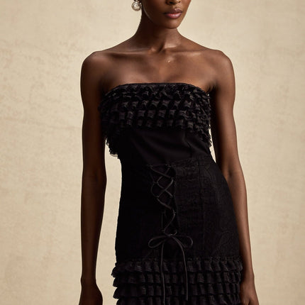 Black mini dress with ruffles and train named Michele
