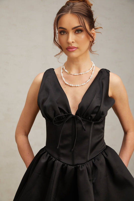 Black mini dress with Vneck and flared skirt named Jeanne