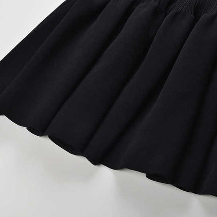 Black off-shoulder bodycon dress with bow detail and flared bottom